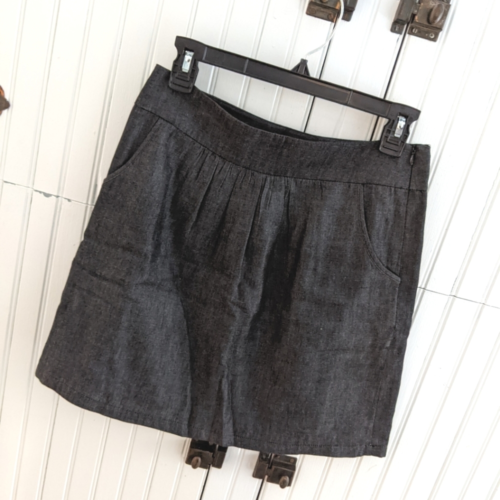 Charcoal mini skirt. Worn once as Hermione. Francesca's Collections, size 4